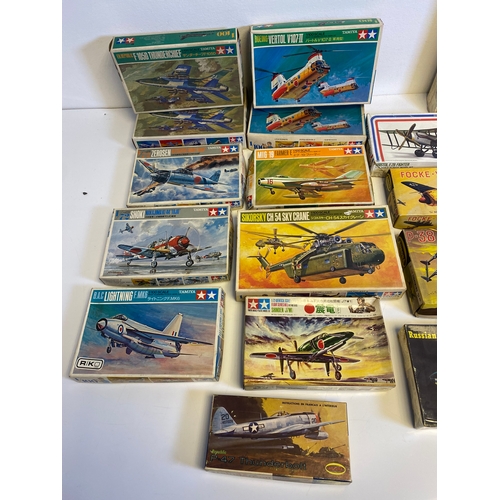 316 - A collection of Tamiya and Aurora Model plane kits including Tamiya, Zerosen (Hamp), Shinden, B.A.C ... 