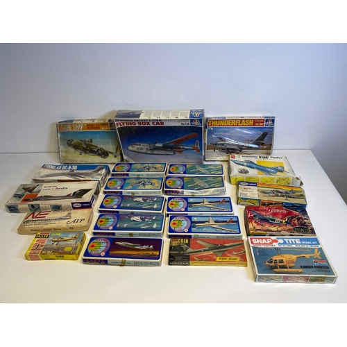 318 - A collection of Model plane kits including Italeri Fairchild Packet C119G Flying Box Car 146, Mitche... 