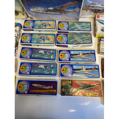 318 - A collection of Model plane kits including Italeri Fairchild Packet C119G Flying Box Car 146, Mitche... 