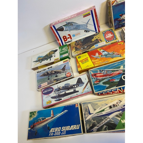 319 - A collection of Various Model plane assembly kits including LindBerg B-1 Bomber, Harrier, P-47B Thun... 