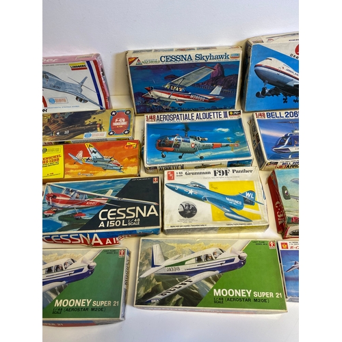 319 - A collection of Various Model plane assembly kits including LindBerg B-1 Bomber, Harrier, P-47B Thun... 