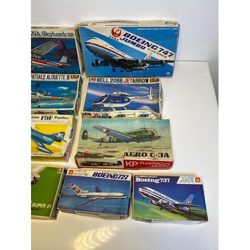 319 - A collection of Various Model plane assembly kits including LindBerg B-1 Bomber, Harrier, P-47B Thun... 