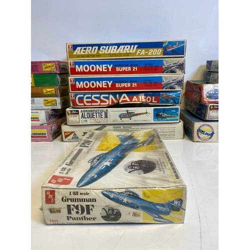 319 - A collection of Various Model plane assembly kits including LindBerg B-1 Bomber, Harrier, P-47B Thun... 