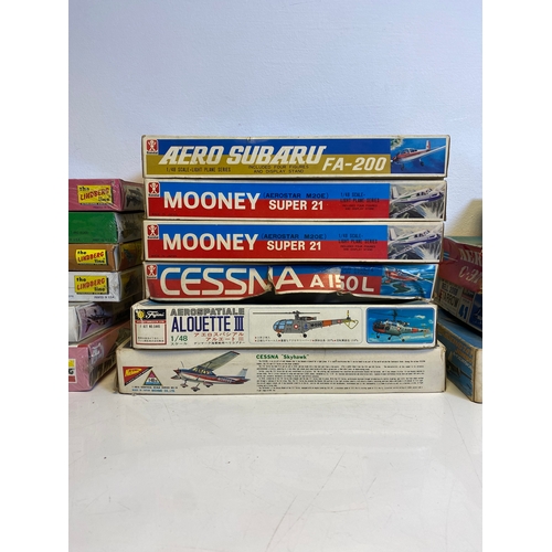 319 - A collection of Various Model plane assembly kits including LindBerg B-1 Bomber, Harrier, P-47B Thun... 