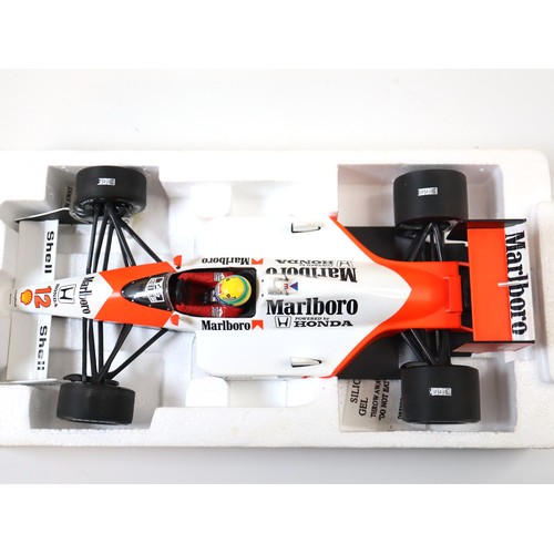 3 - Ayrton Senna McLaren Honda MP4/4 World Champion - 1988 1:18 Scale Model by Minichamps +  Ayrton Senn... 