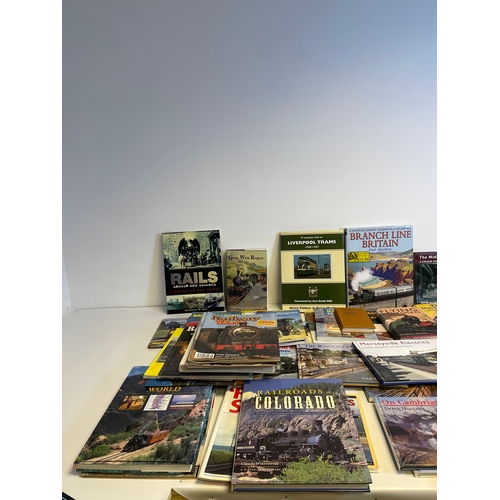 323 - A collection of Train related books including Railroads of Colorado, Flying Scotsman by Andrew Roden... 