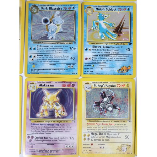 355 - Pokemon TCG - A group of cards from Legendary, Gym Challenge / Heroes including Alakazam 1/110, Dark... 