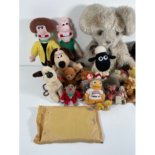 343 - A collection of Various teddy bears and plushies including Wallace and Gromit, TY and Paddington.