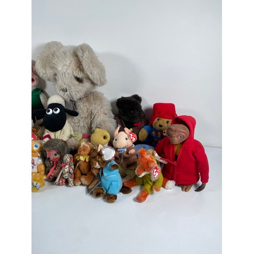 343 - A collection of Various teddy bears and plushies including Wallace and Gromit, TY and Paddington.