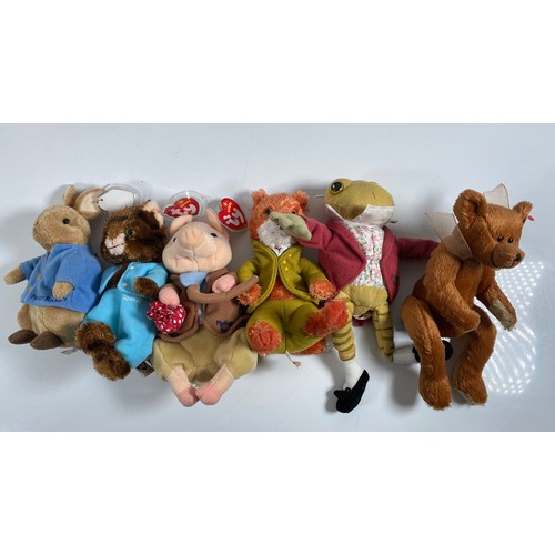 343 - A collection of Various teddy bears and plushies including Wallace and Gromit, TY and Paddington.