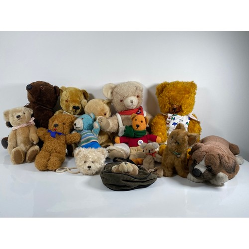 348 - A collection of Miscellaneous teddy bears including Harrods bag.