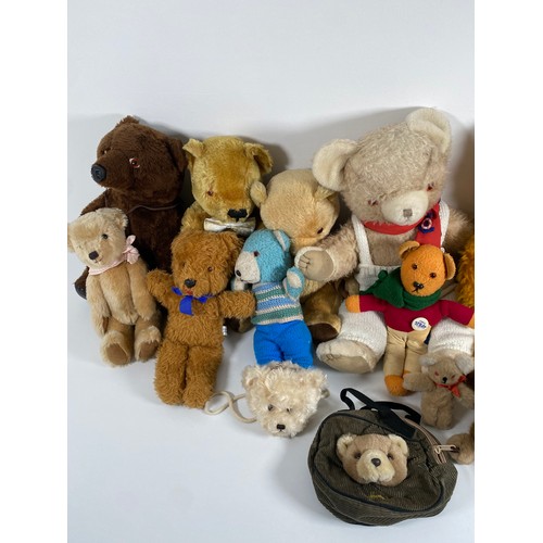 348 - A collection of Miscellaneous teddy bears including Harrods bag.