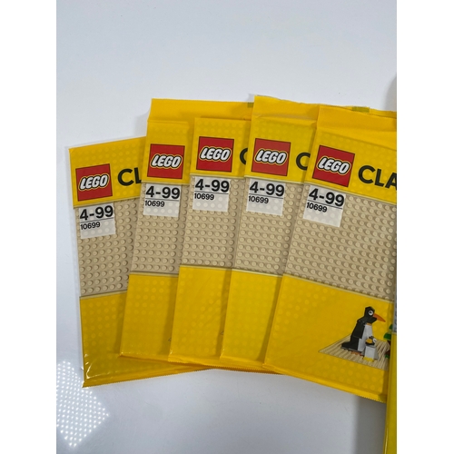 366 - Five 10699, Two 620, 10701 and One 628 Lego base plates sealed and unopened.