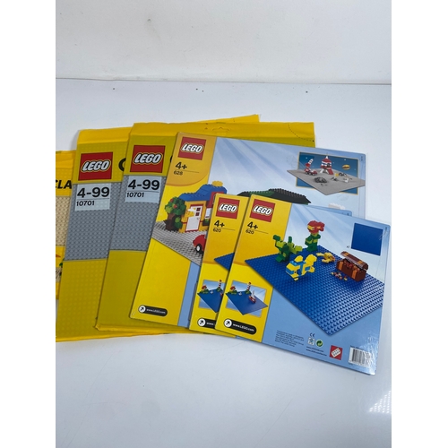 366 - Five 10699, Two 620, 10701 and One 628 Lego base plates sealed and unopened.