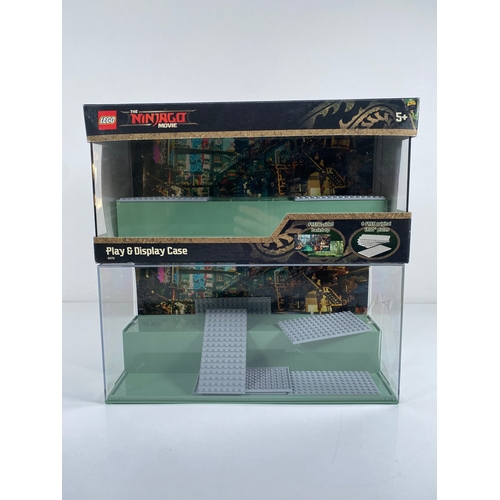 369 - Eight Lego NINJAGO play and display cases