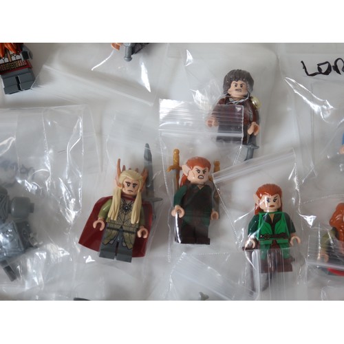 166 - LEGO Minifigures - A group of various figures from The Lord of the Rings / The Hobbit including Elve... 