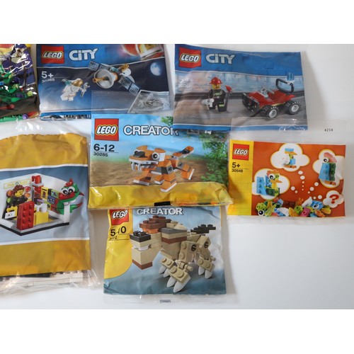 194 - LEGO - Various Minifigure and Mini Set Poly bags including 5001622 LEGO Store Employee, 5005233 Haml... 