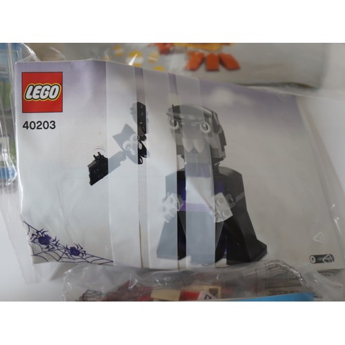 195 - LEGO A group of various pre built and sealed poly bag sets as shown