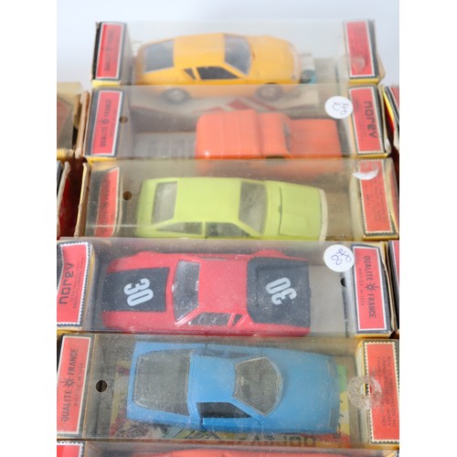 240 - A collection of 31 1970's Norev Plastic 1:43 Scale Model Cars / Racing Cars in original boxes includ... 