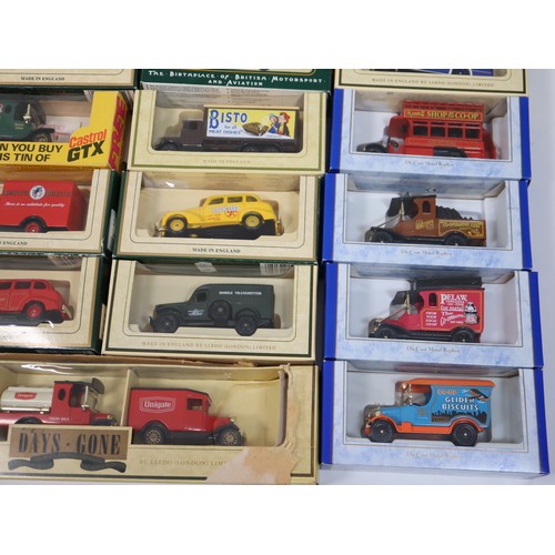 398 - A quantity of Lledo scale die-cast commercial livery vans etc