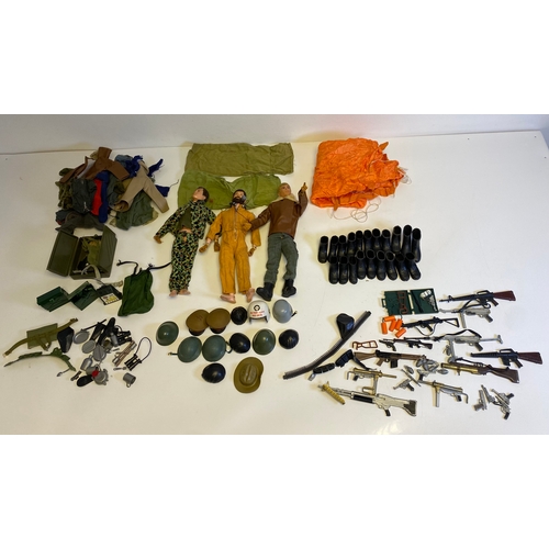 437 - Three Vintage Action Man with a bundle of various accessories including, Guns, Boots, clothes and Pa... 