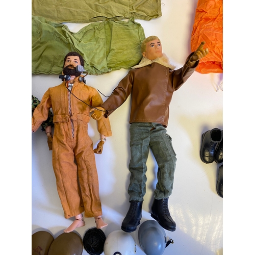 437 - Three Vintage Action Man with a bundle of various accessories including, Guns, Boots, clothes and Pa... 