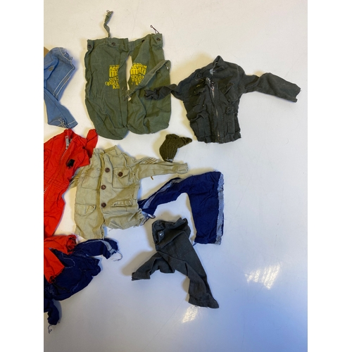 437 - Three Vintage Action Man with a bundle of various accessories including, Guns, Boots, clothes and Pa... 