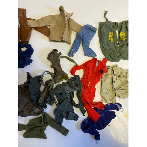 437 - Three Vintage Action Man with a bundle of various accessories including, Guns, Boots, clothes and Pa... 