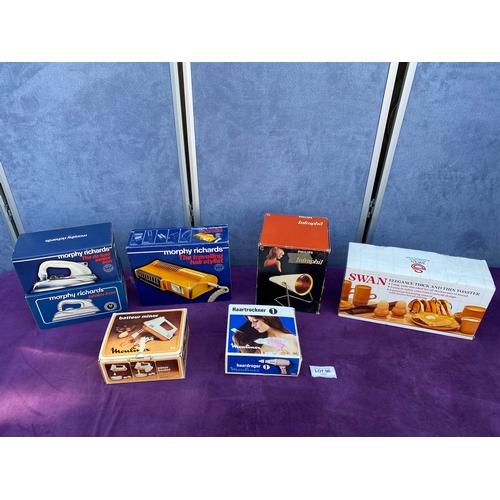 A group of retro Boxed Electronic items including Morphy Richards, Philips and Swan