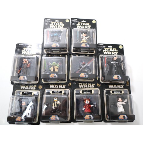 A collection of Star Wars Star Tours Disney Characters includes Minnie Mouse as Princess Leia, Minnie Mouse as Queen Amidala, Mickey Mouse as Anakin Skywalker, Donald Duck as Han Solo, Goofy as Darth Vader, Donald Duck as Darth Maul, Goofy as Jar Jar Binks, Stitch as Yoda, Stitch as Emperor Palpatine & Mickey Mouse as Luke Skywalker   - Sealed / Boxed