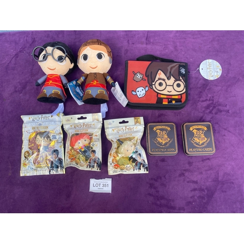 Harry Potter bundle including Two Mini clip pens, Mini Note book, Pencil case, Harry and Ron quidditch plushies and Two packs of playing cards.