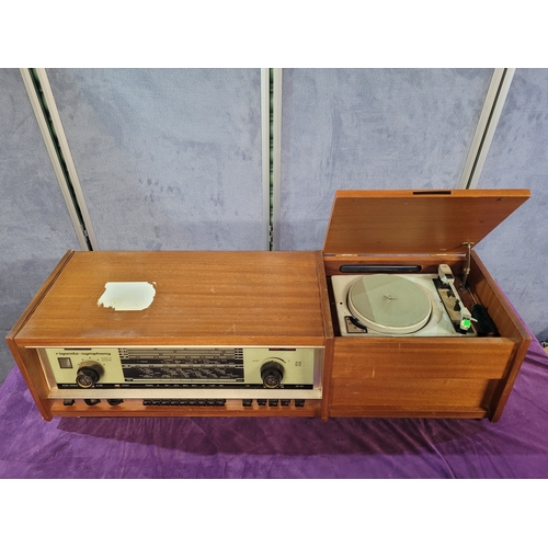 450A - Rigonda Symphony Radiogram with Turntable

Vintage Rigonda Symphony radiogram in a wooden cabinet, f... 