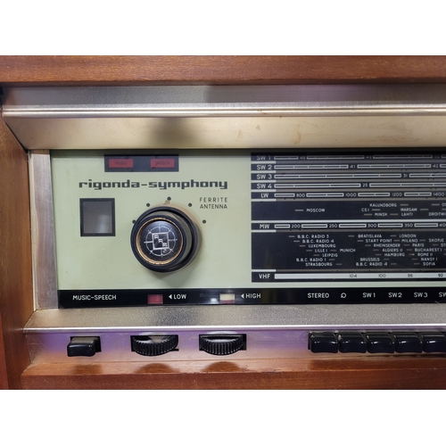 450A - Rigonda Symphony Radiogram with Turntable

Vintage Rigonda Symphony radiogram in a wooden cabinet, f... 