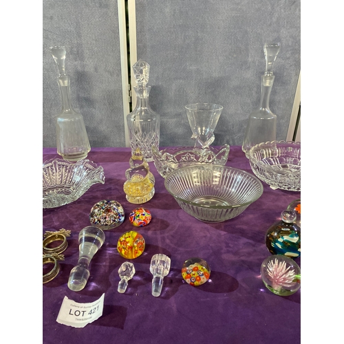 421 - A quantity of Collectable glasswares including, Bowls, Decanters, Paper weights and some Napkin ring... 