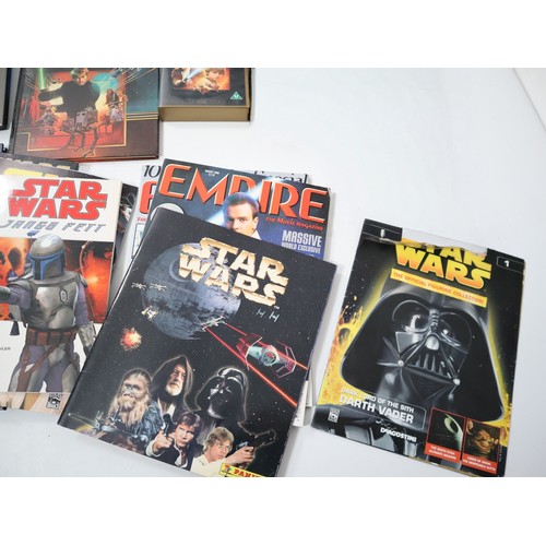 224 - A collection of various Star Wars collectables and books including The Star Wars Vault Hardback, 198... 