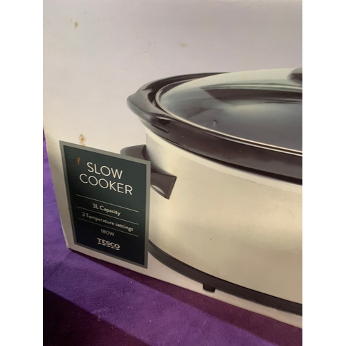 461 - A collection of electrical goods including a Russell Hobbs iron (22520), Tesco slow cooker (SCSS12),... 