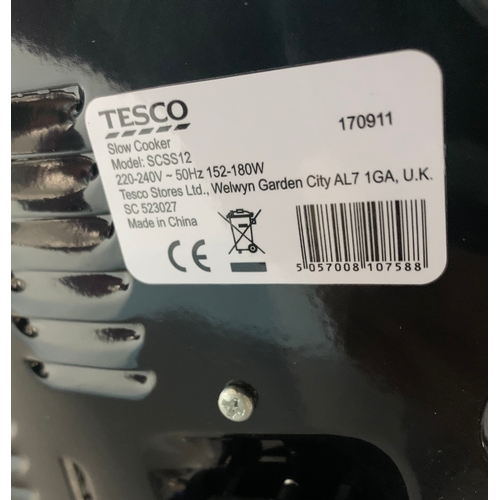 461 - A collection of electrical goods including a Russell Hobbs iron (22520), Tesco slow cooker (SCSS12),... 