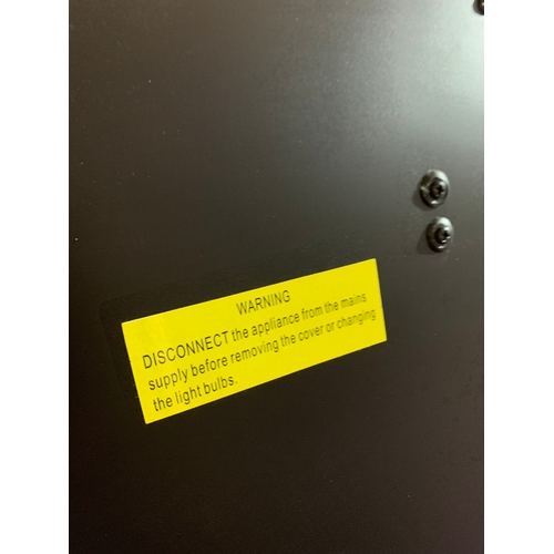 462 - A Dimplex opti-myst electric fire place including remote control