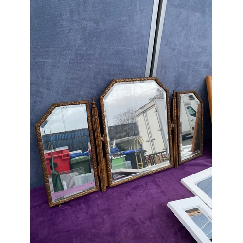 556 - Three dressing table/tri folding mirrors.
