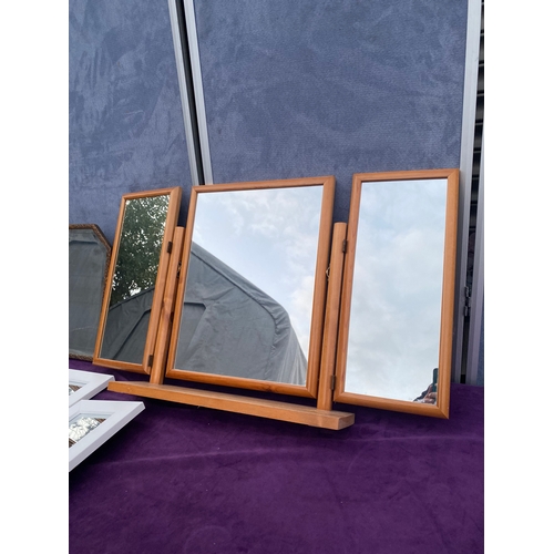 556 - Three dressing table/tri folding mirrors.