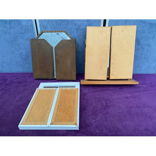 556 - Three dressing table/tri folding mirrors.