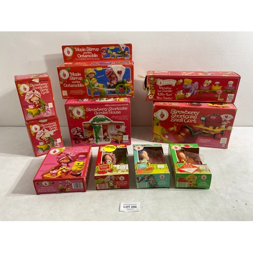 200 - A Collection of Strawberry Shortcake toys in original boxes by Kenner includes Strawberry Shortcake ... 