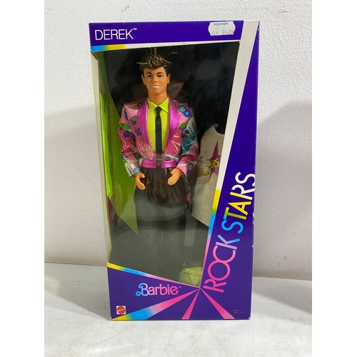 201 - Barbie Magic Pegasus Prince Aidan, Rockstars Derek and Baywatch Dolls with Various Barbie clothes an... 