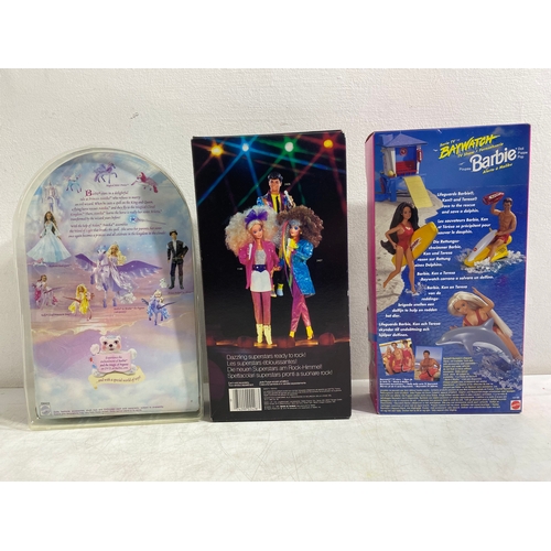 201 - Barbie Magic Pegasus Prince Aidan, Rockstars Derek and Baywatch Dolls with Various Barbie clothes an... 