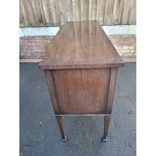 558 - Antique Serpentine Mahogany sideboard