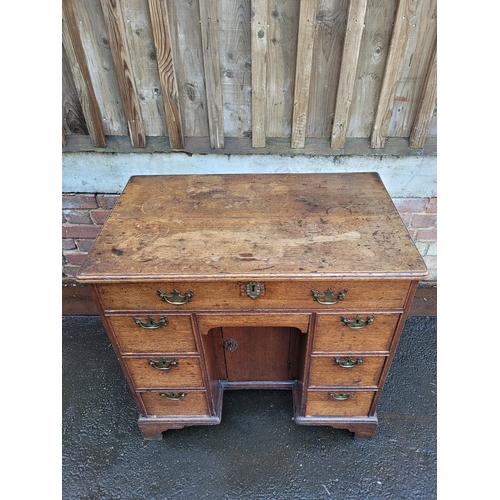 565 - Antique 19th Century Oak knee hole desk