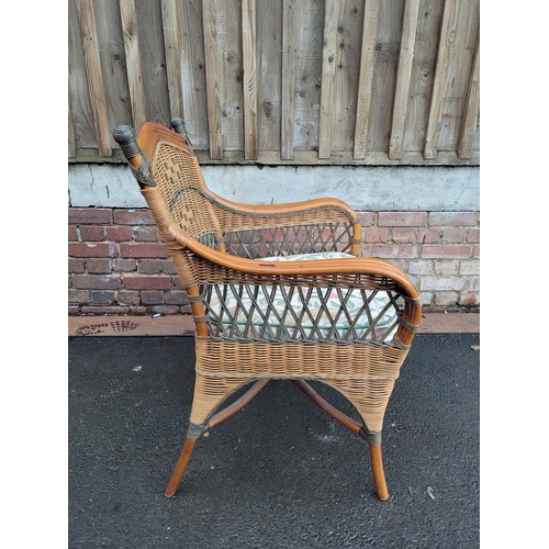 574 - Vintage Rattan and cane arm chair