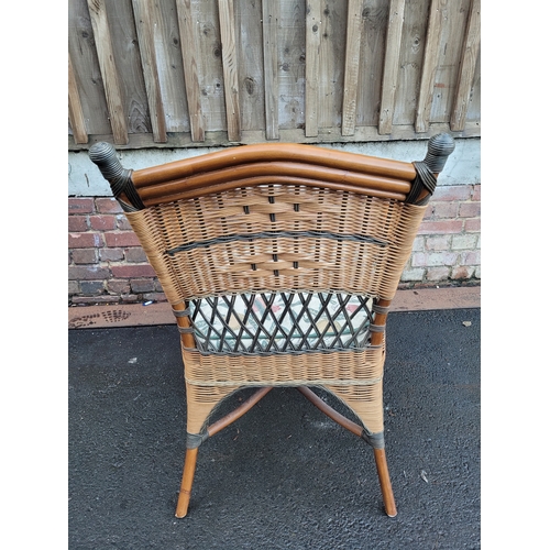 574 - Vintage Rattan and cane arm chair