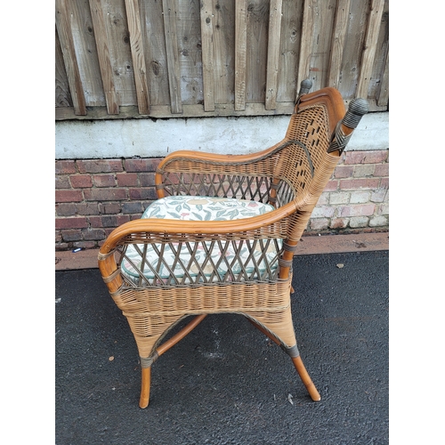 574 - Vintage Rattan and cane arm chair