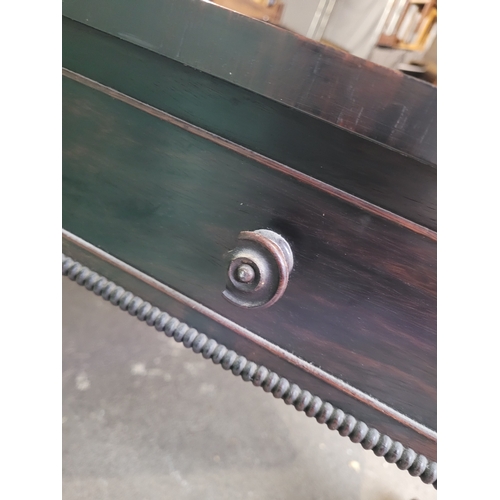 583 - Antique desk with beaded trimming